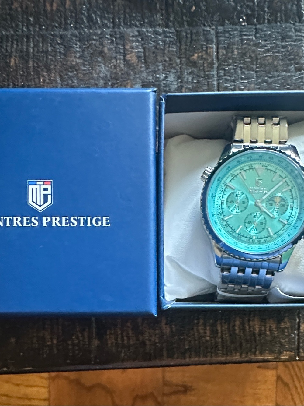 Men’s Silver Watch with Turquoise Dial